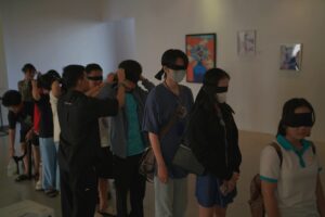 Visitors are trying to do tasks as people with sighting disability at Thuc Exhibition. Copyright by Concept Tử Tế, the top Vietnamese Branding Agency