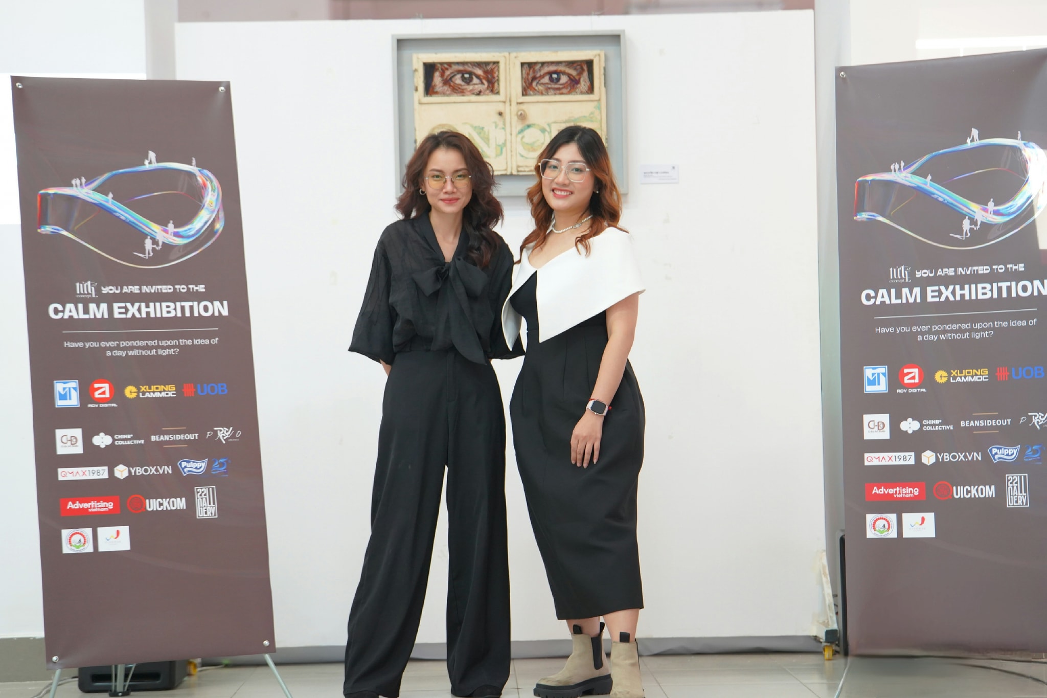 Our founders at Calm Exhibition. Copyright by Concept Tử Tế, the top Vietnamese Branding Agency